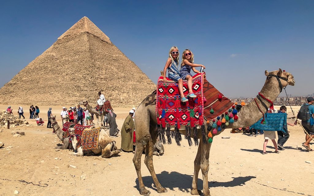 Visiting the Sphinx and Pyramids of Giza on a sunny day in Egypt