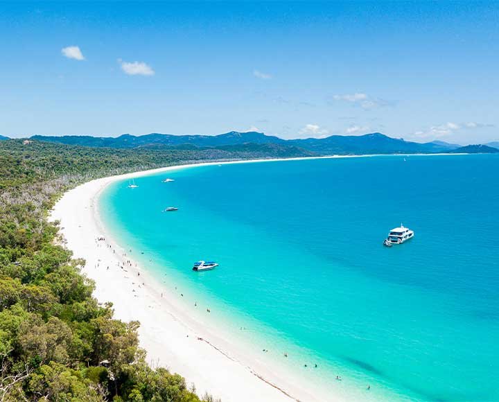 Enjoy Summer Times at the World’s Best Beaches" – Tropical beach paradise ideal for sunbathing and swimming.
