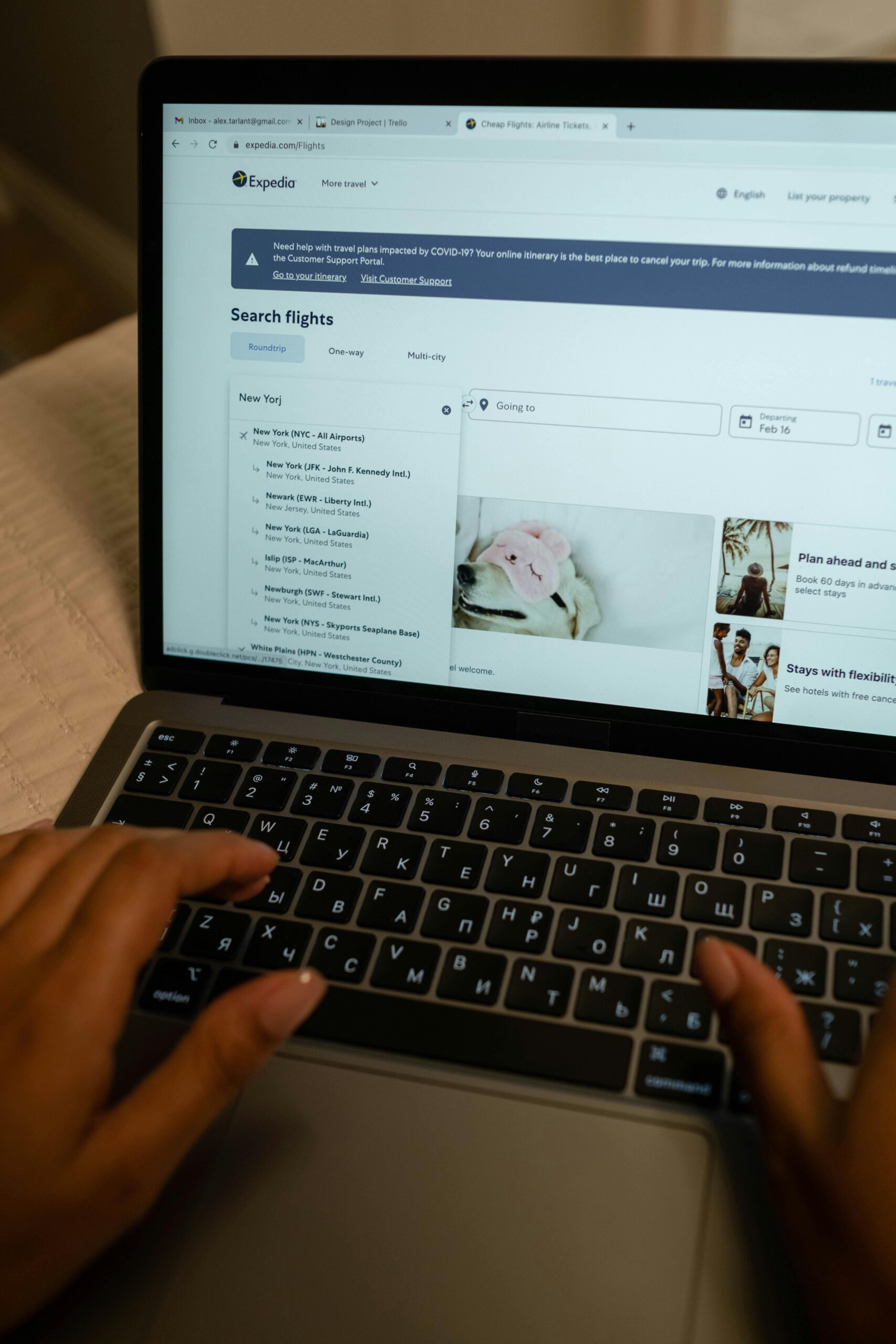 Booking flights online and planning trips with travel insurance coverage